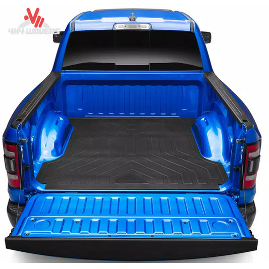 Full view of GMC Sierra standard bed fitted with custom black rubber Husky bed mat SKU 16005