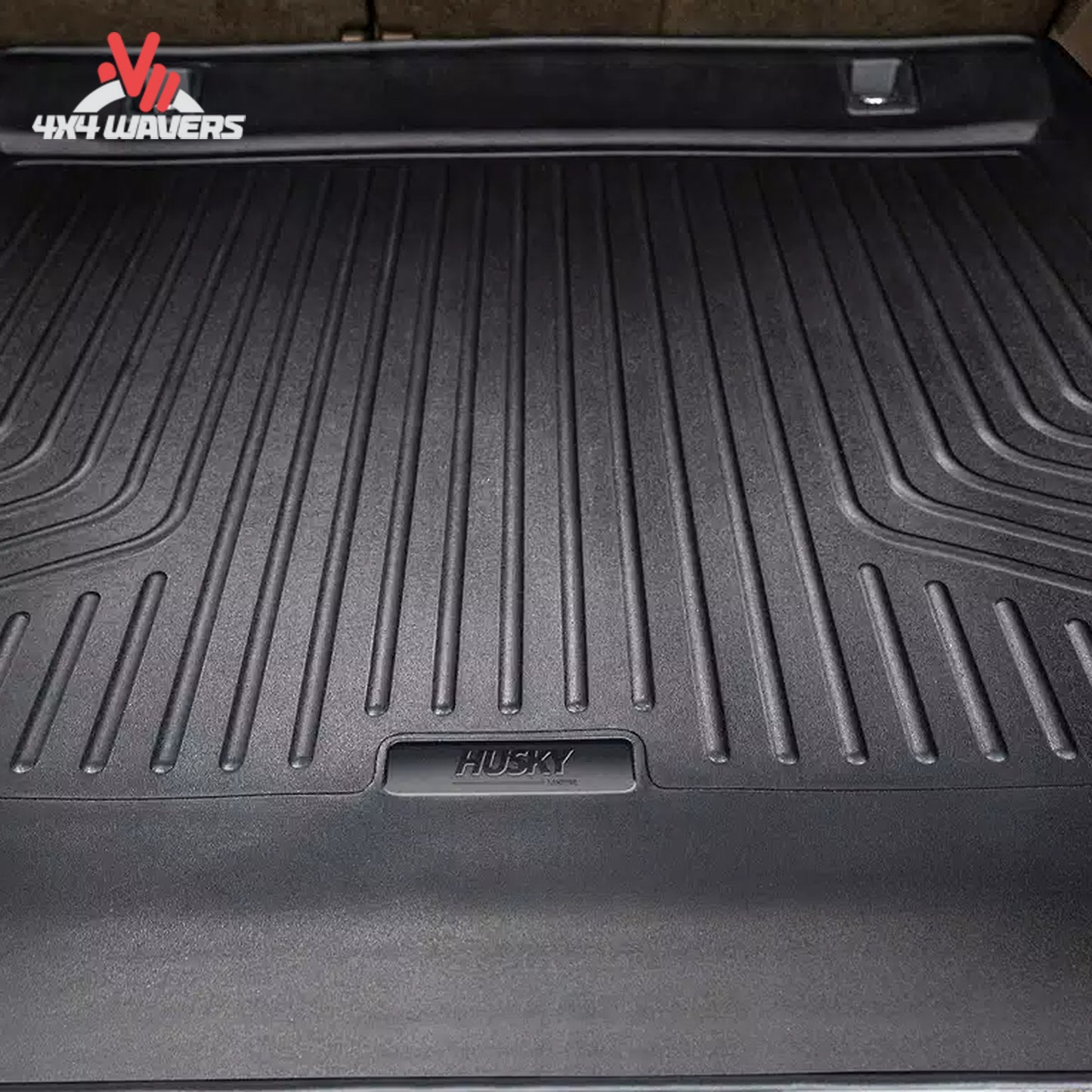 Custom-fit Husky WeatherBeater cargo liner installed in a two-door Ford Bronco cargo area