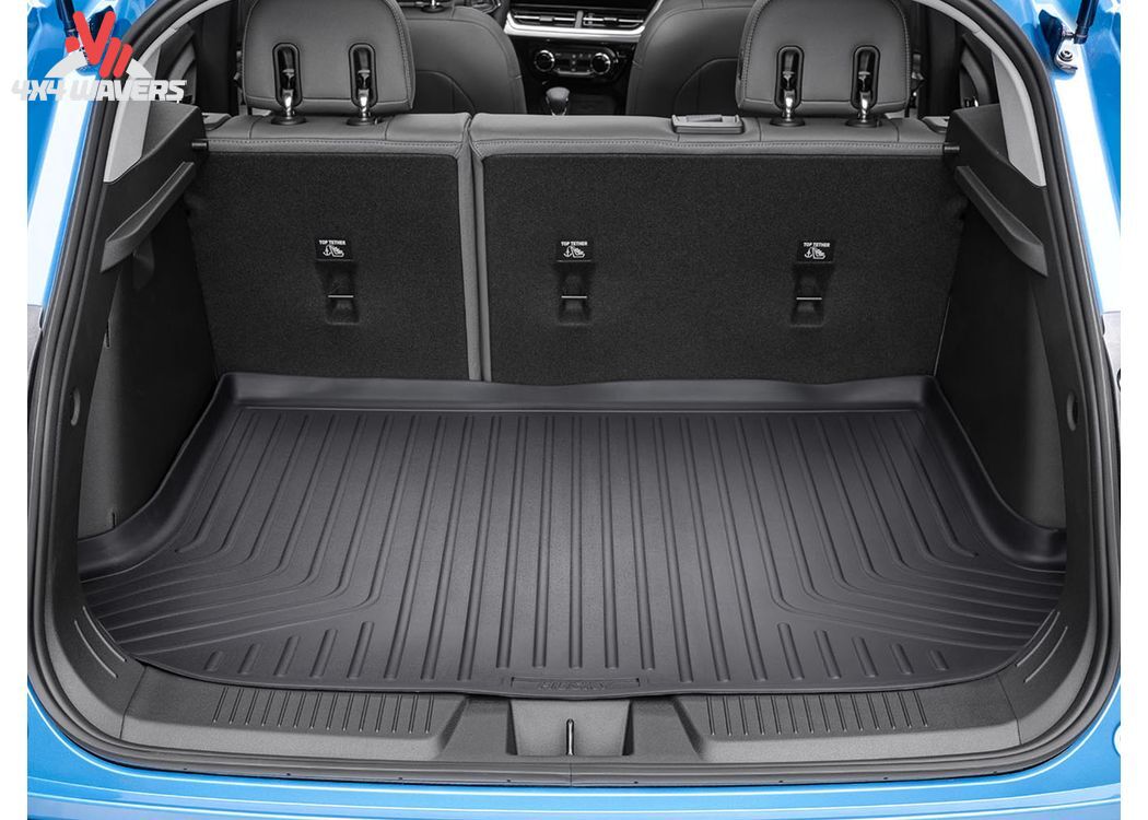 Husky WeatherBeater cargo liner in Jeep Wrangler JL Unlimited cargo area, durable black floor mat with textured surface.