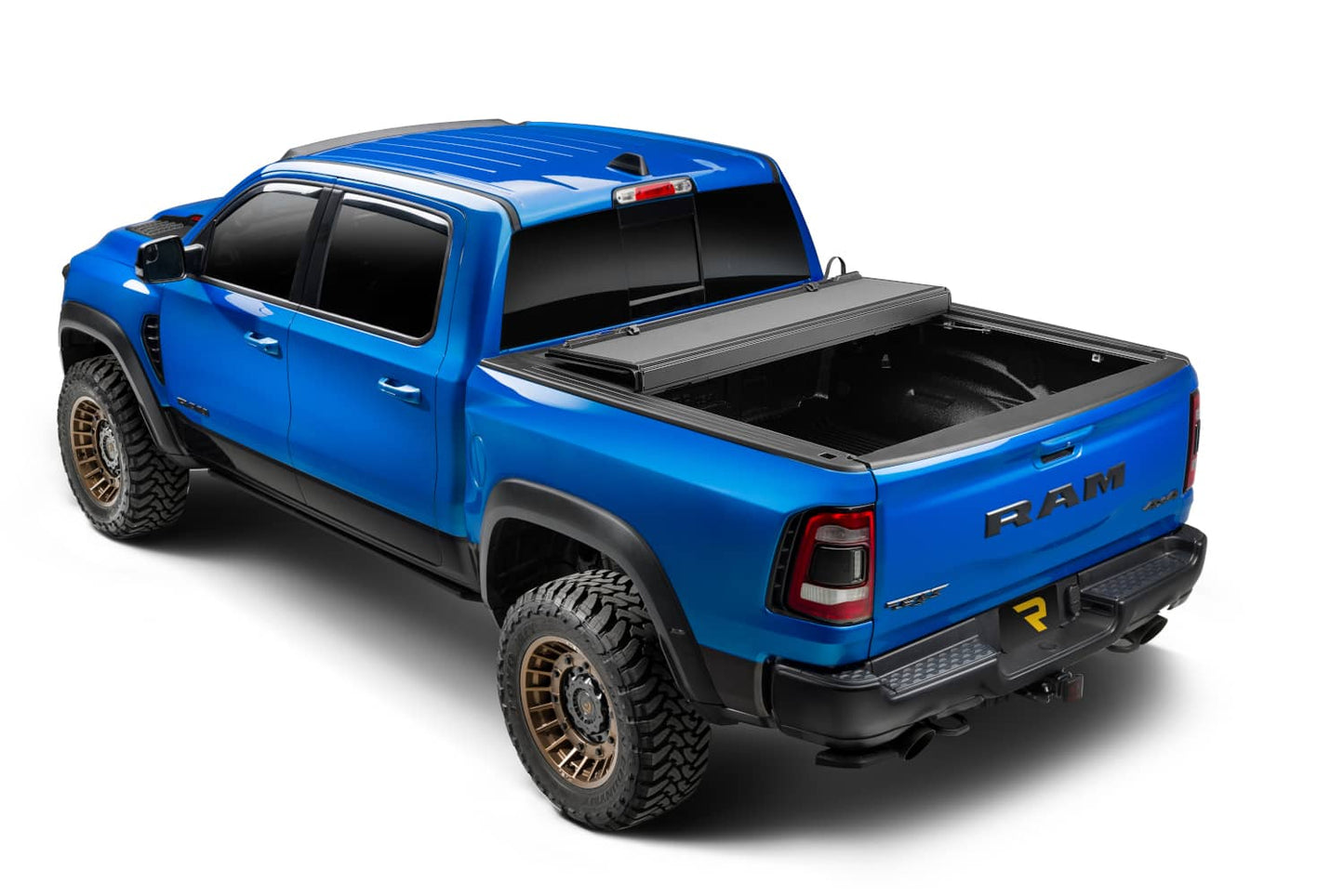 Extang Endure ALX hard folding tonneau cover folded open on a 2020-2026 Jeep Gladiator 5FT bed, showcasing durable truck bed protection.