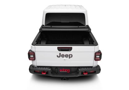 Extang Trifecta 2.0 soft folding tonneau cover on a 2020-2026 Jeep Gladiator 5ft bed, showing its sleek, foldable design.