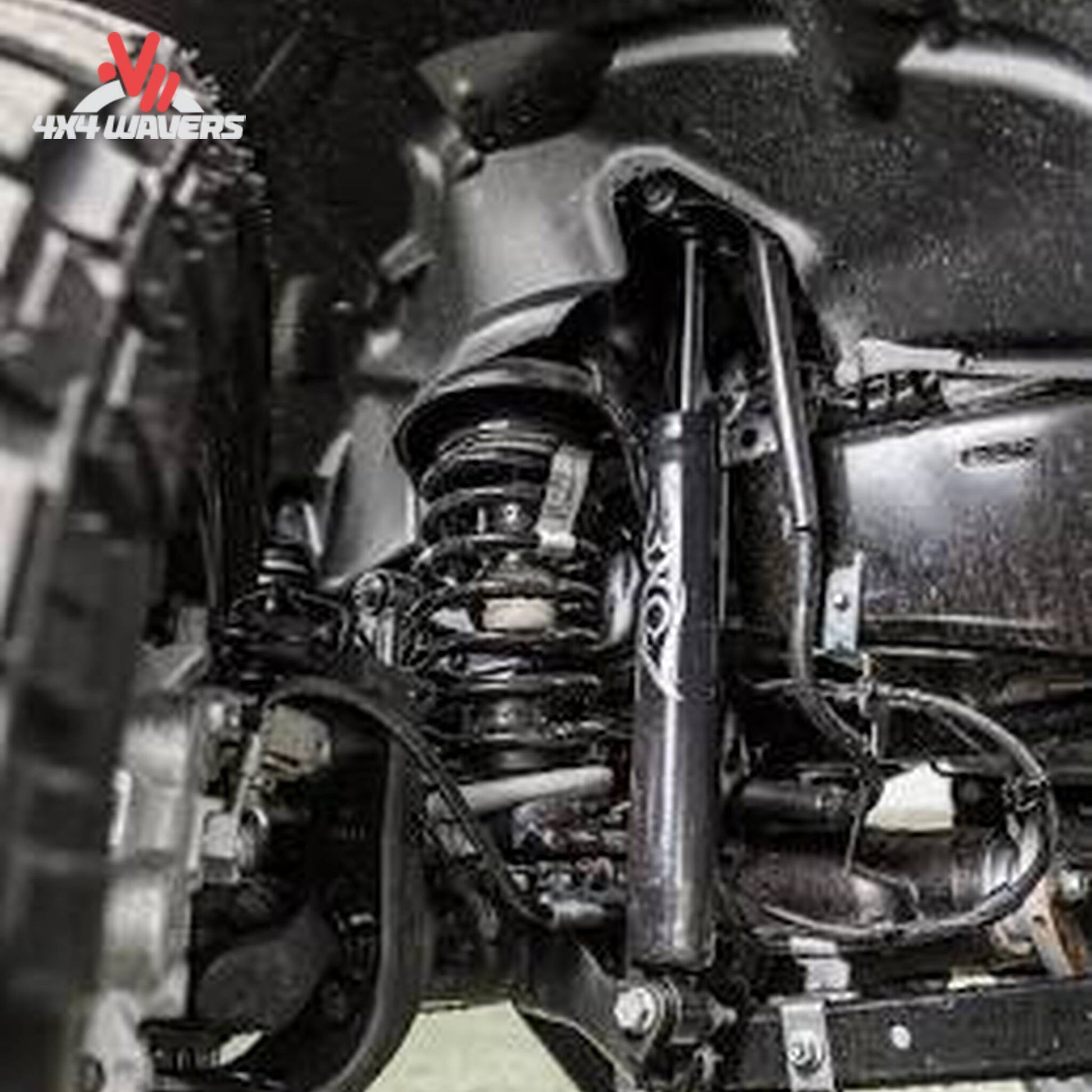 2007-2011 Jeep Wrangler JK with Zone Offroad 4 inch lift kit and 35 inch tires; Lifted Jeep Wrangler JK displaying increased ground clearance and aggressive off-road stance with FOX-equipped suspension