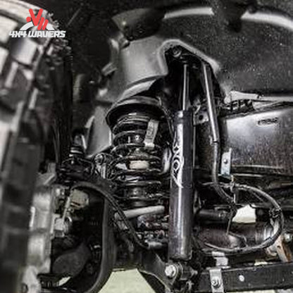 2007-2011 Jeep Wrangler JK with Zone Offroad 4 inch lift kit and 35 inch tires; Lifted Jeep Wrangler JK displaying increased ground clearance and aggressive off-road stance with FOX-equipped suspension
