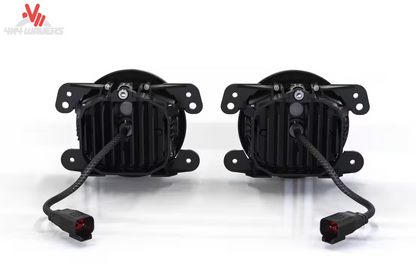 Morimoto 4Banger fog light brackets installed on a 2007-2018 Jeep Wrangler JK for off-road lighting upgrade.