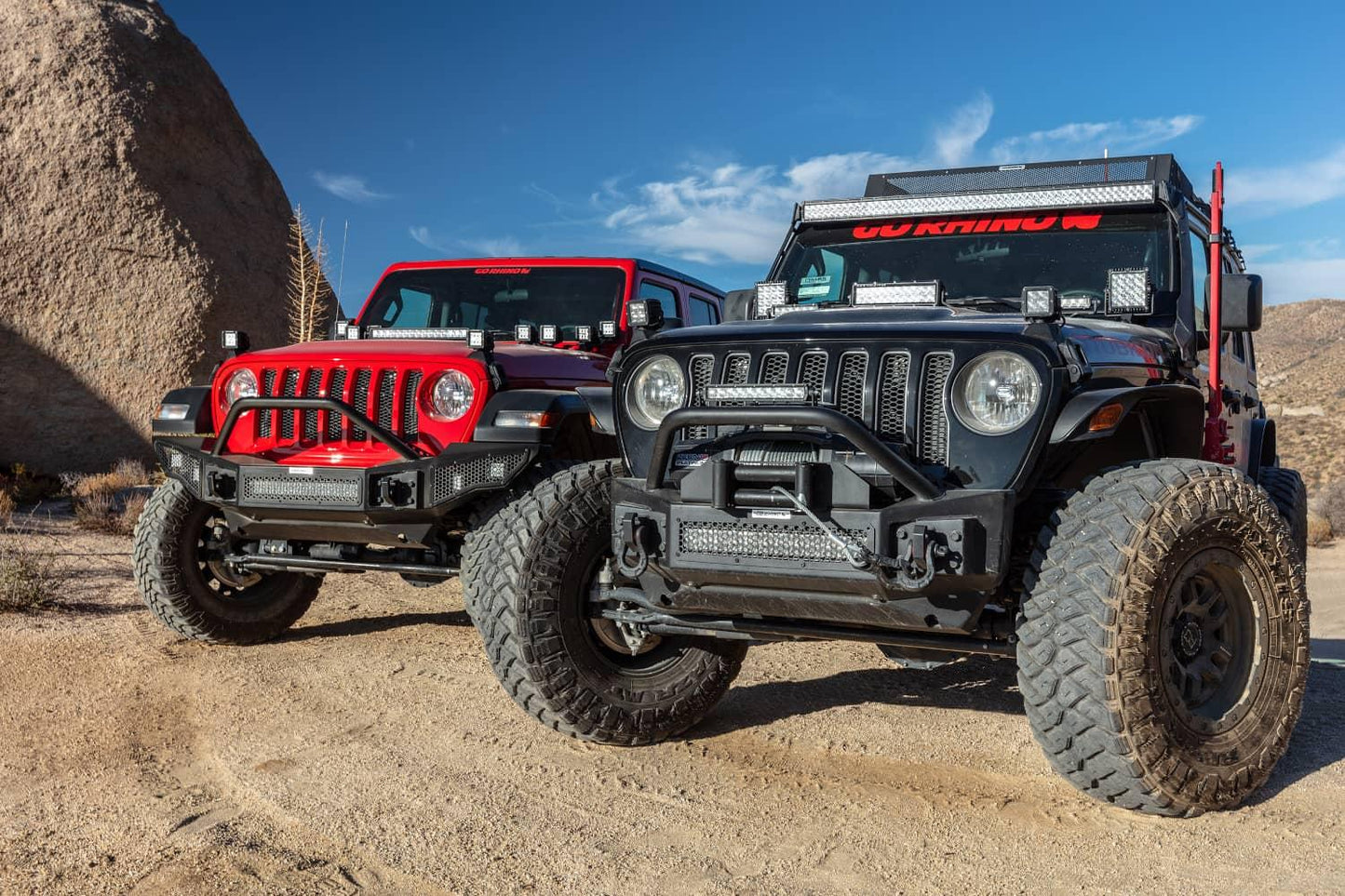 Go Rhino Rockline Stubby front winch bumper with overrider bar on a 2020-2023 Jeep Wrangler JL, rugged off-road bumper in an angle view