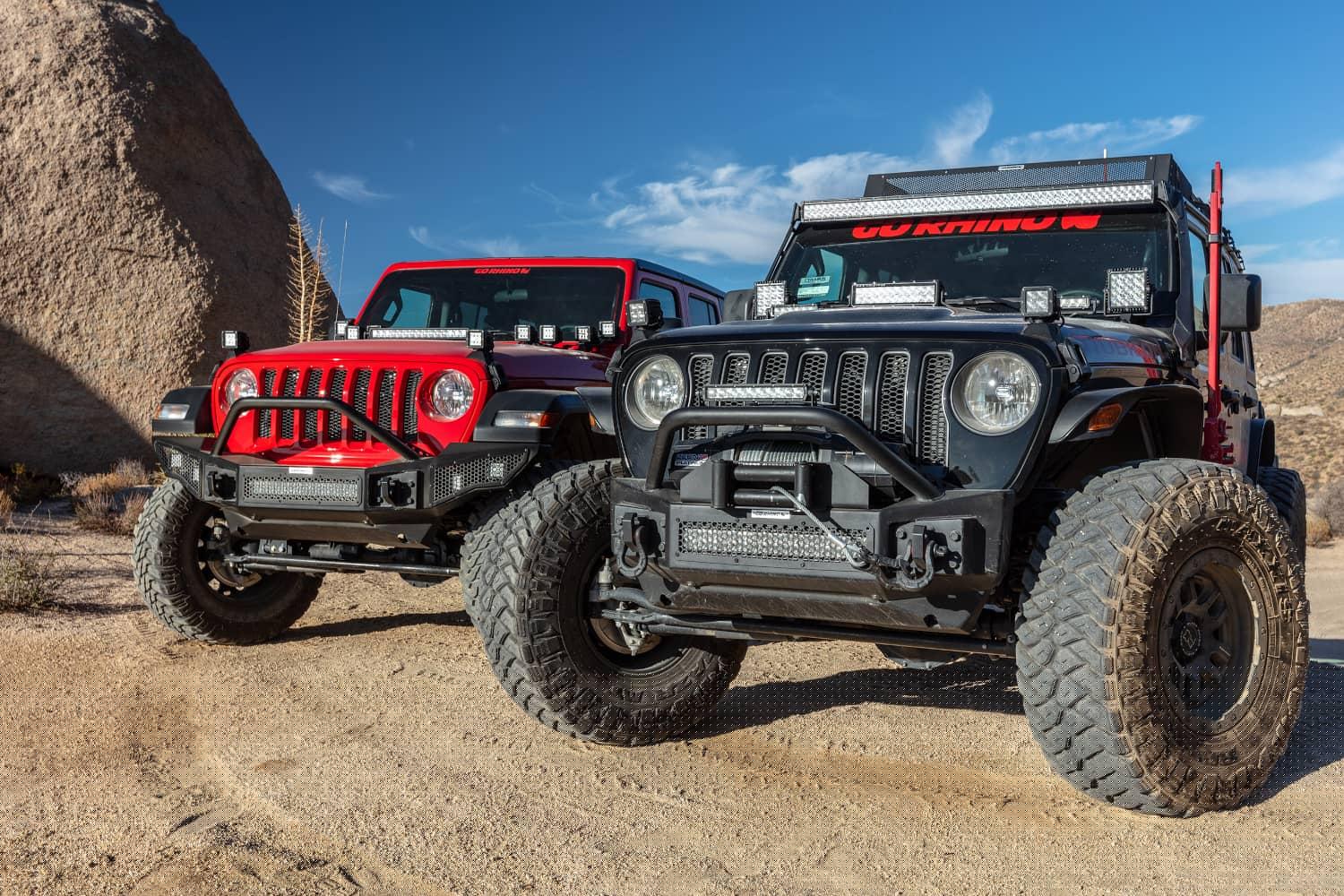 Go Rhino Rockline Stubby front winch bumper with overrider bar on a 2020-2023 Jeep Wrangler JL, rugged off-road bumper in an angle view