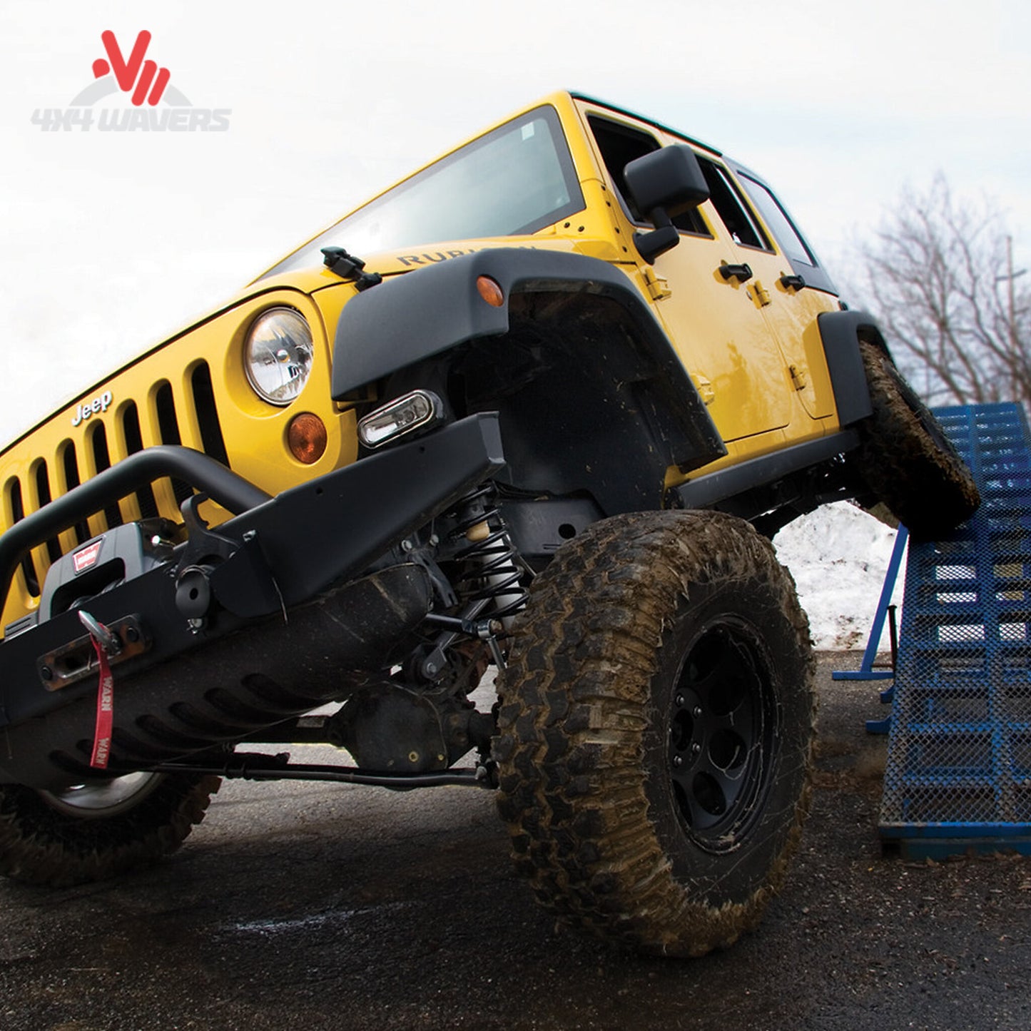 Lifted Jeep Wrangler JK Unlimited showcasing improved ground clearance and off-road stance with Zone Offroad suspension