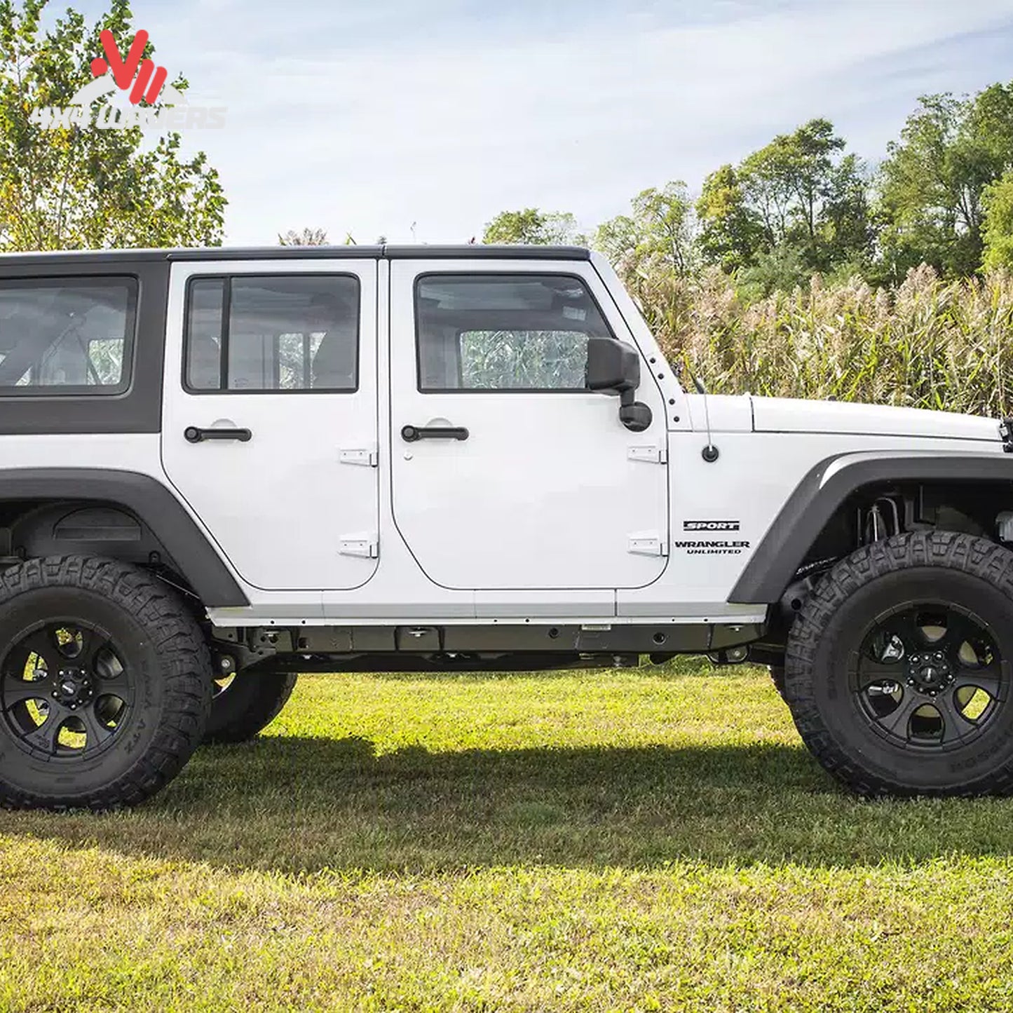 Close-up view of upgraded suspension geometry and lifted ride height on a Jeep Wrangler JK