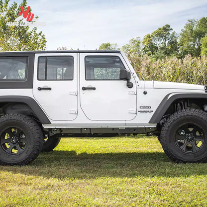 Close-up view of upgraded suspension geometry and lifted ride height on a Jeep Wrangler JK