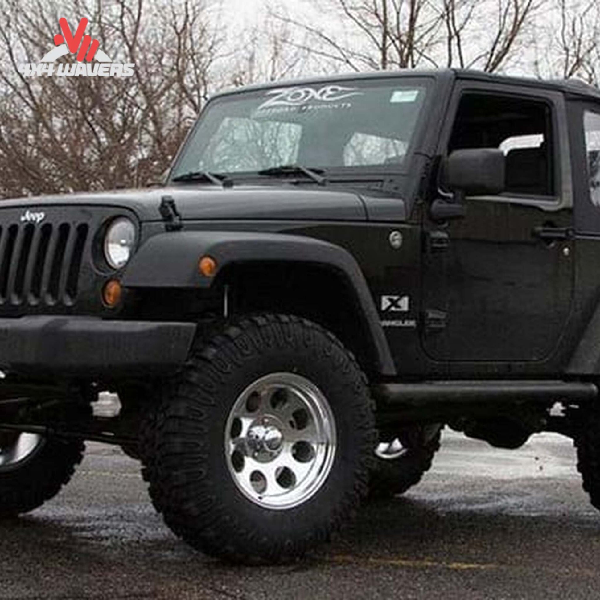 Lifted Jeep Wrangler Unlimited showing increased tire clearance and trail-ready stance