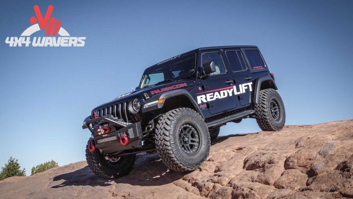 Side view of a 2018-2026 Jeep Wrangler JL Rubicon with ReadyLIFT 2.5-inch SST lift kit installed, showcasing the lifted stance.