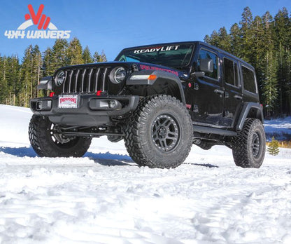 ReadyLIFT 2.5-inch SST lift kit installed on a 2018-2026 Jeep Wrangler JL Sahara and Sport, shown from a side view with lifted suspension.