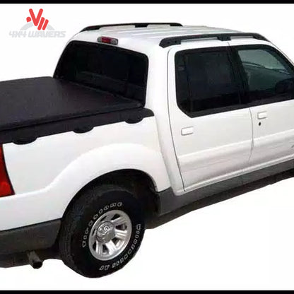 A durable black vinyl soft roll up truck bed cover installed on a short box Ford F-150 Lightning SKU BGPC_31369.