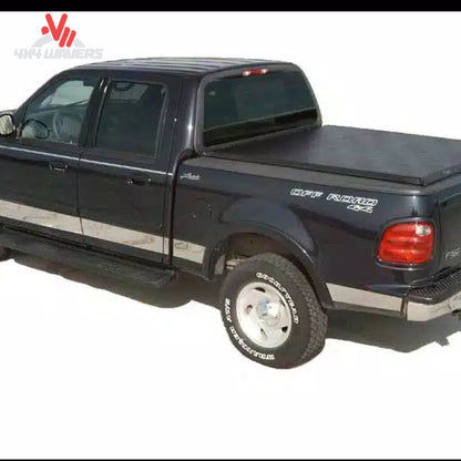 LITERIDER roll up bed cover 31379 rolled forward to cab with standard storage straps SKU BGPC_31379.