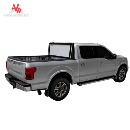 LOMAX hard folding tonneau cover textured black urethane B3010029 for Ford F-150 6.5 foot bed.