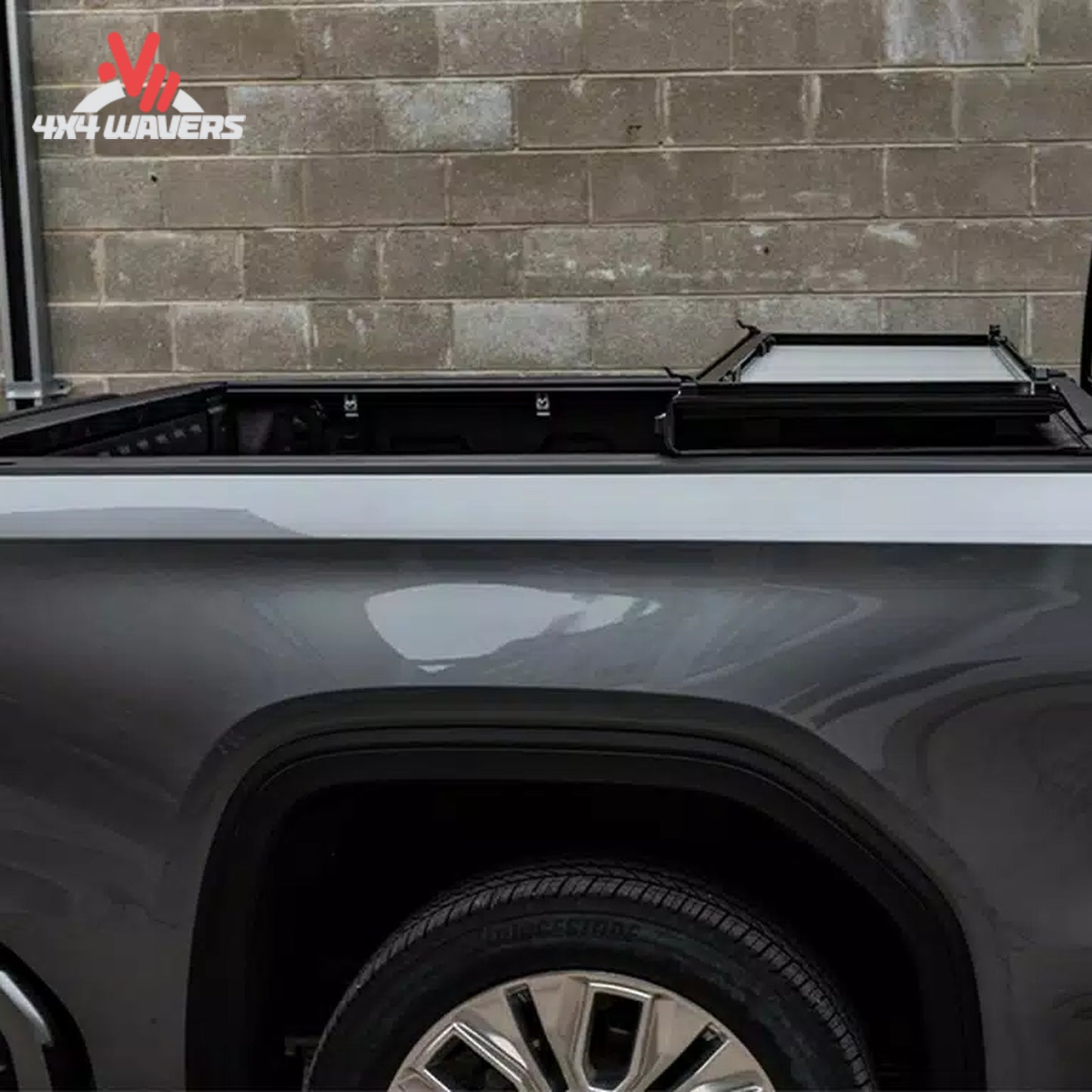 LOMAX Stance hard folding tonneau cover textured black urethane G3010029 for Ford F-150 6.5 foot bed.