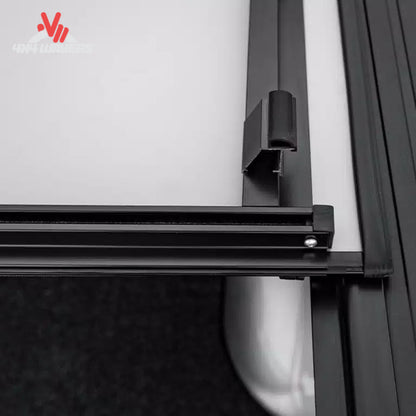 LOMAX Stance hard folding tonneau cover textured black urethane G3010029 for Ford F-150 6.5 foot bed.
