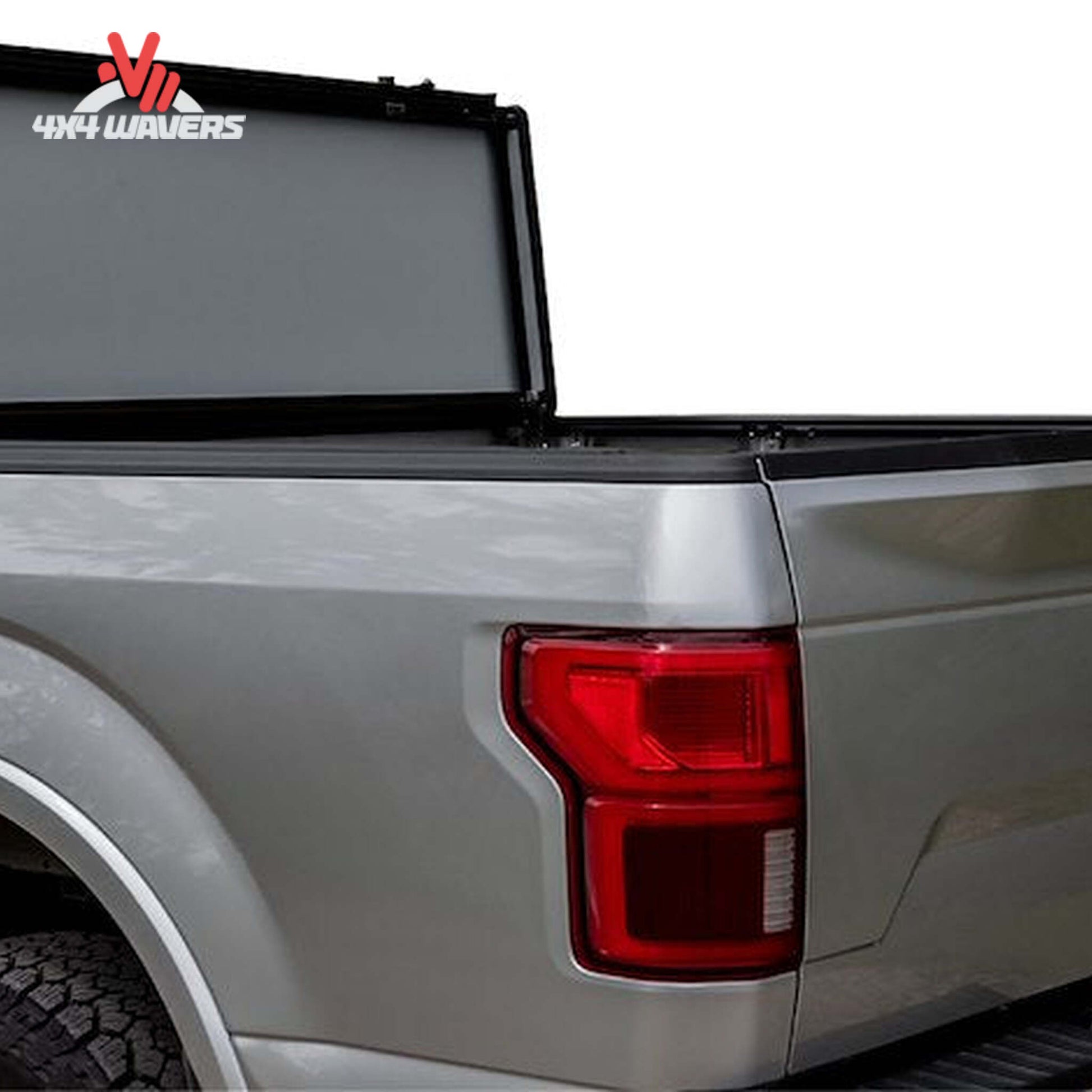 A black Lomax Stance Tonneau Cover by ACI on a 2004-2026 Ford F-150 with a 5.5ft truck bed, installed on the truck bed.