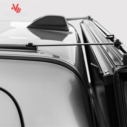 A close-up showing how the low profile aluminum tonneau cover seals tightly against the truck tailgate line.