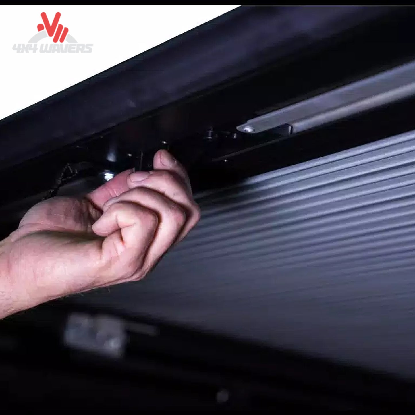Pace Edwards Switchblade retractable tonneau cover with latch handle and pull strap on a 97-14 Ford F-150 6.5' truck bed