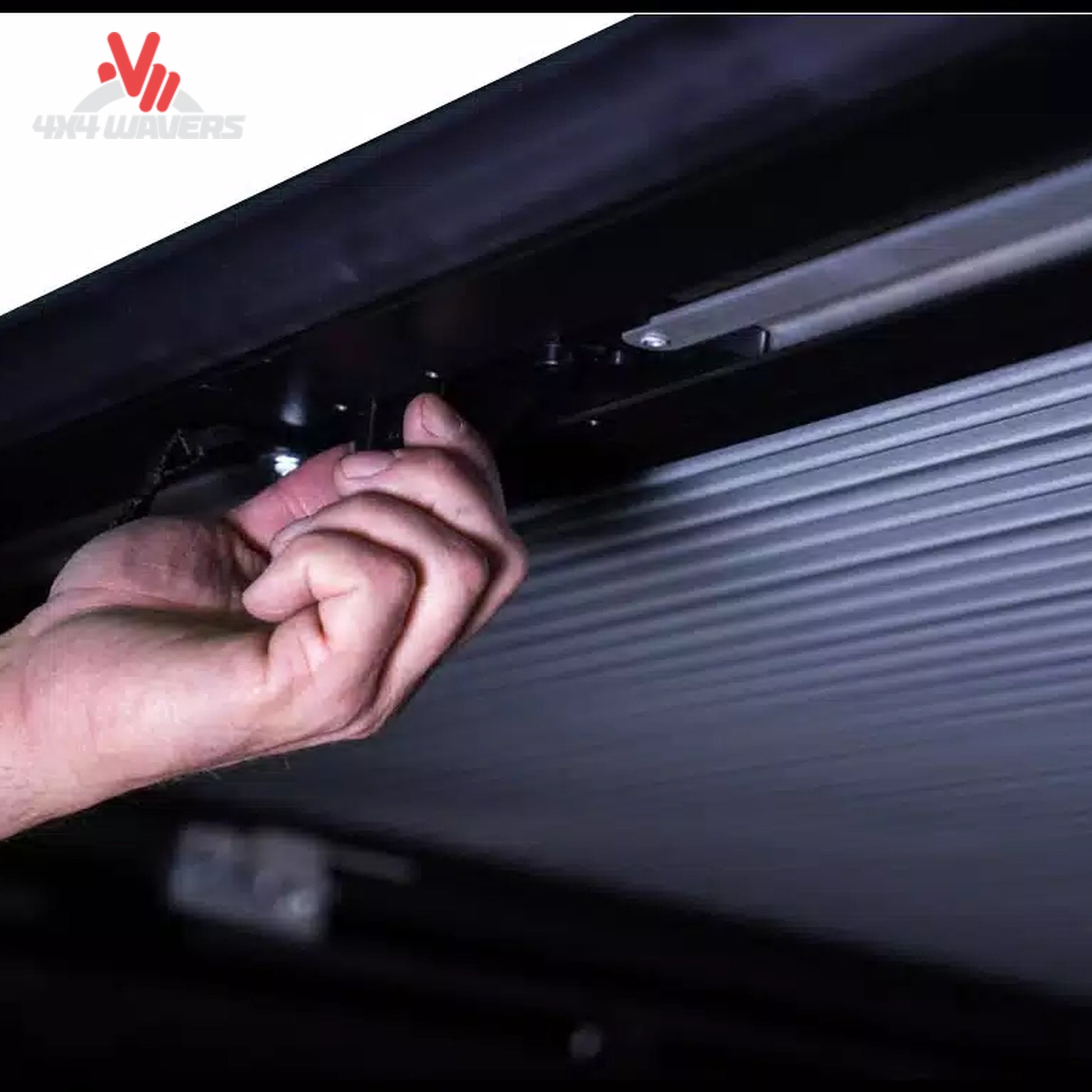 Pace Edwards Switchblade retractable tonneau cover with latch handle and pull strap on a 97-14 Ford F-150 6.5' truck bed