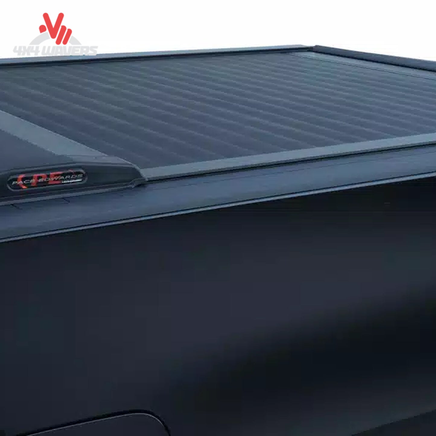 Close-up of Pace Edwards Switchblade hard retractable tonneau cover canister on a 97-14 Ford F-150 with a 6.5-foot bed.