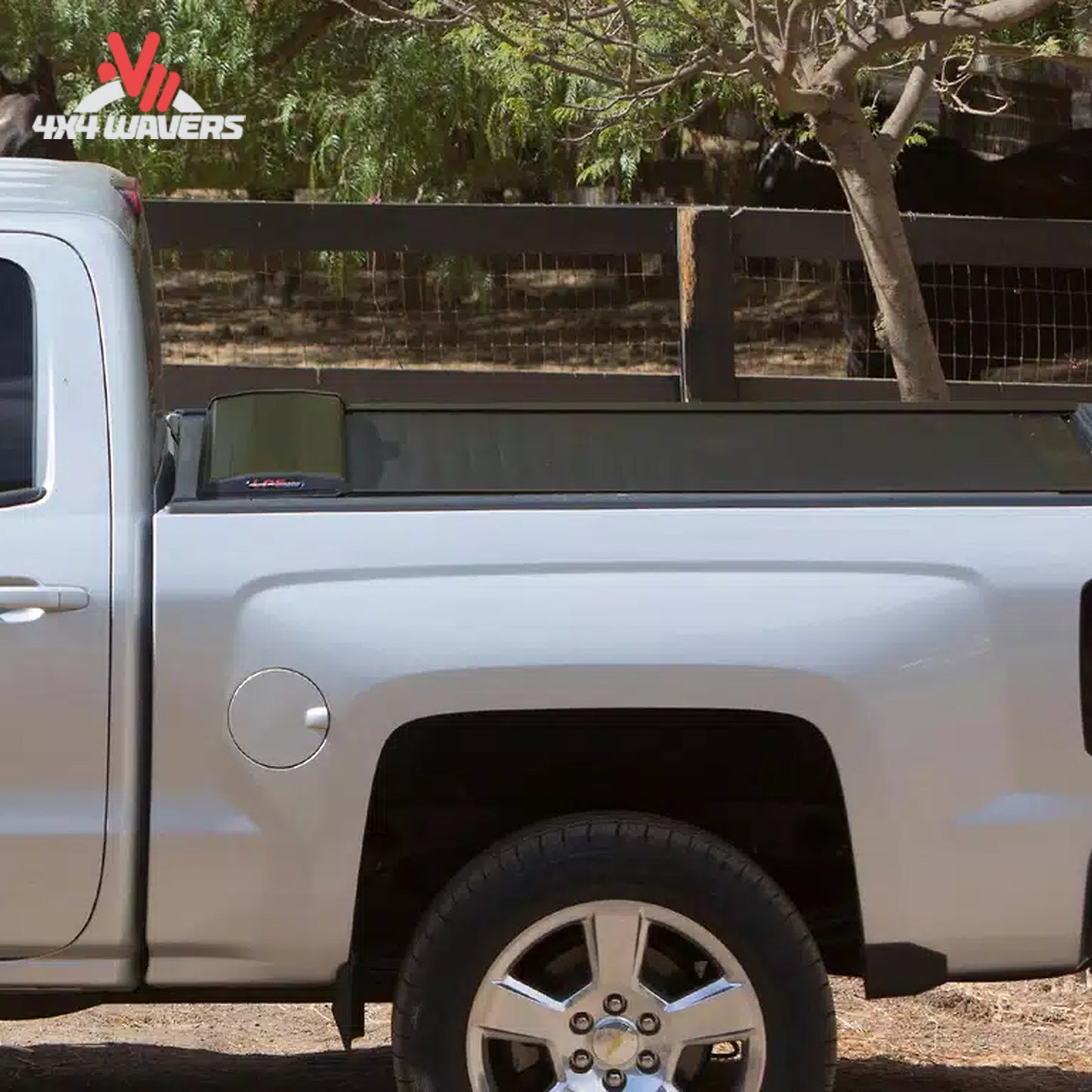 Close-up of Pace Edwards Switchblade retractable tonneau cover canister on a 97-14 Ford F-150 with 6.5-foot truck bed.