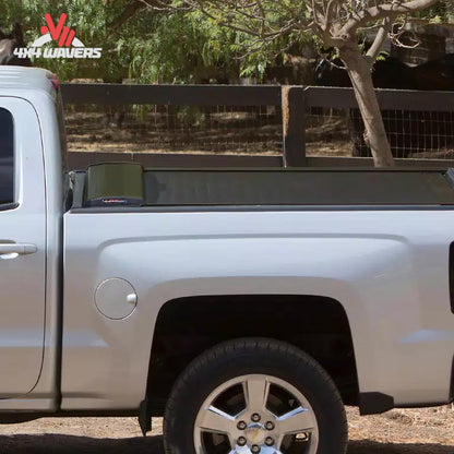 Close-up of Pace Edwards Switchblade retractable tonneau cover canister on a 97-14 Ford F-150 with 6.5-foot truck bed.