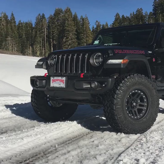 Jeep Wrangler JL Rubicon using ReadyLIFT suspension system on rocky terrain