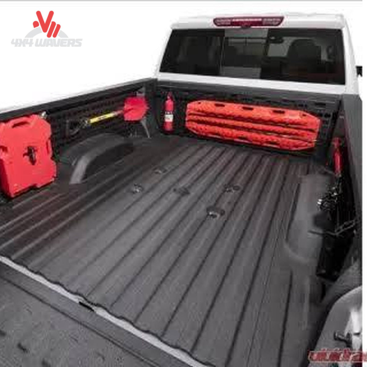 Putco Modular MOLLE Bed Panel on Ford F-150 Raptor 5.5' bed with tools and gear for organized storage on passenger side.