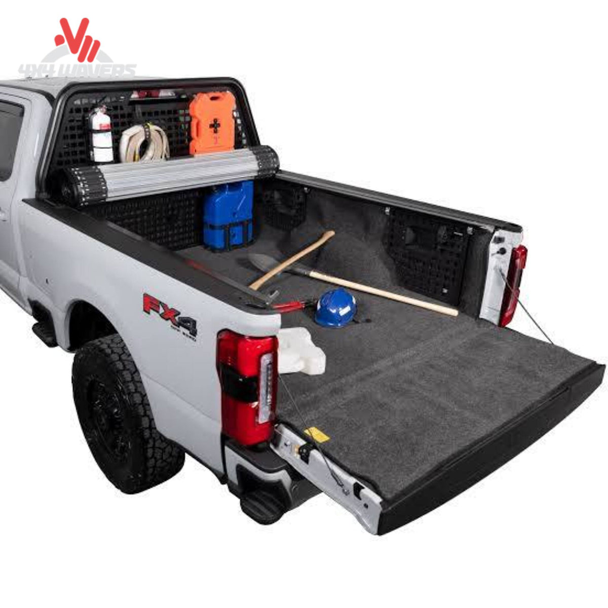 Putco Modular MOLLE Bed Panel on Ford F-150 Raptor with tools and gear in 5.5' bed for secure storage and organization.
