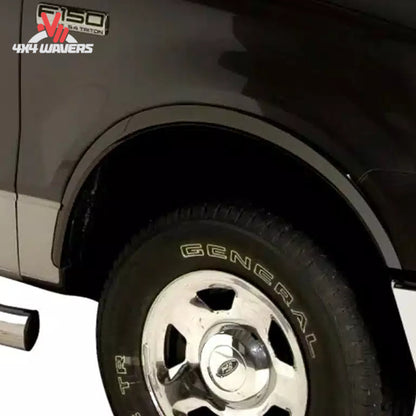 Putco stainless steel fender trim kit installed on a 2015-2017 Ford F150, showcasing sleek fender flare enhancements.