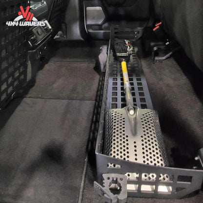 Putco MOLLE under seat storage system with loaded gear bags and clamps for Ford F-150 and F-250/F-350 SuperCrew trucks.