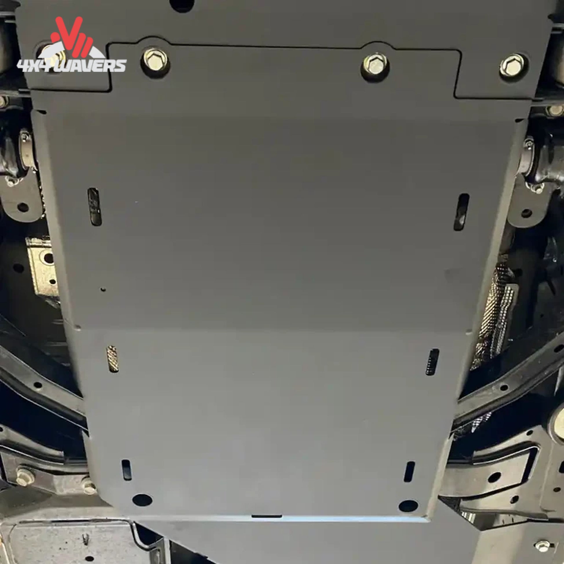 Underbody view showing transmission protection system mounted beneath a Ford Bronco