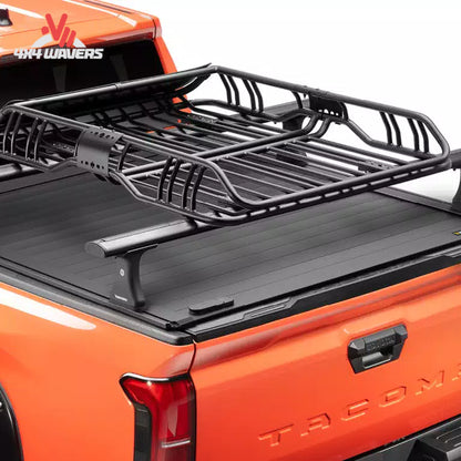 RealTruck Elevate Standard Cargo Basket installed on an overland truck rack carrying camping and adventure gear