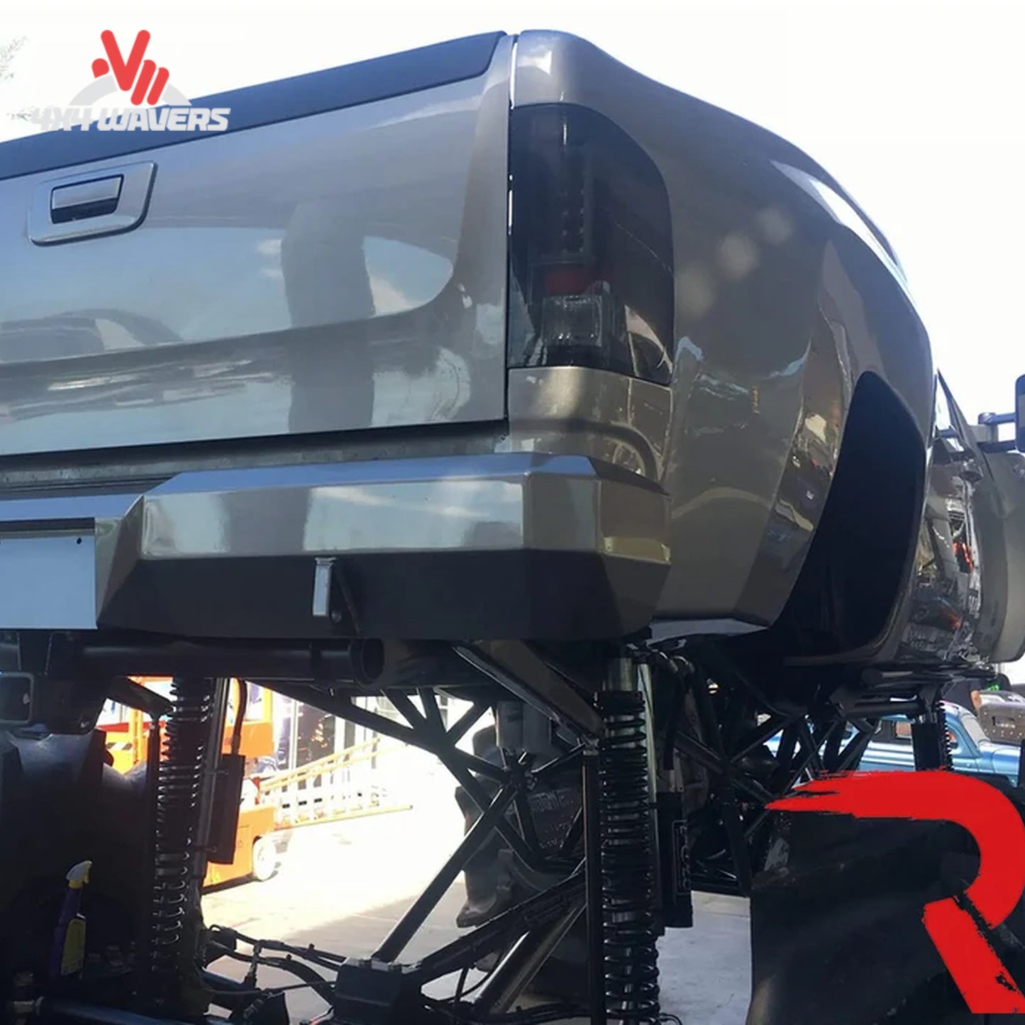 Recon smoked LED tail lights installed on 2007-2013 Silverado and 2007-2014 HD truck, showcasing sleek smoked lens and bright LED illumination.