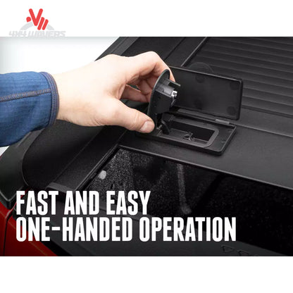 RetraxONE MX tonneau cover latch and key lock mechanism on a Ford F-150 6.5' bed, showcasing secure locking features.