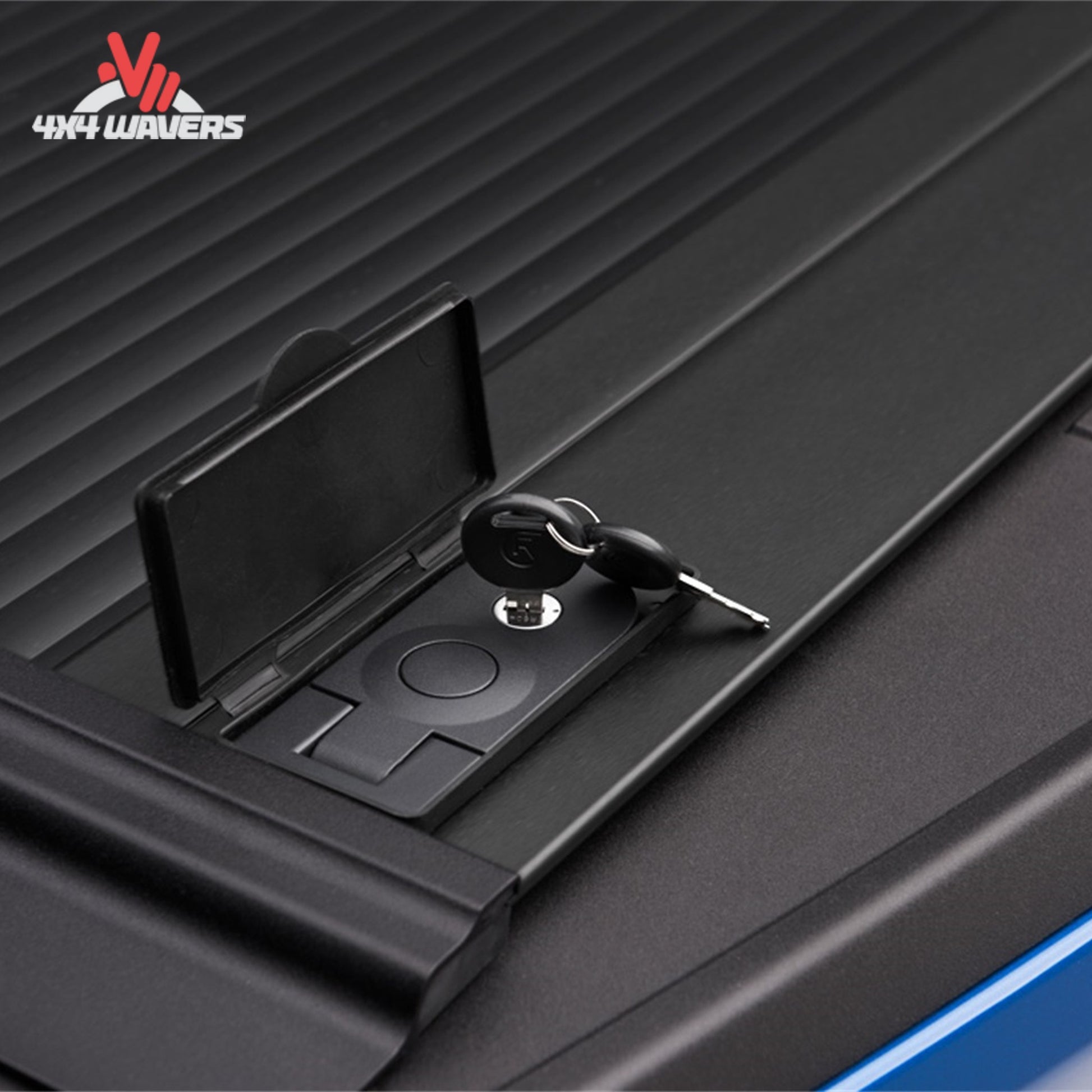 RetraxONE MX tonneau cover latch with key lock mechanism on a 2009-2014 Ford F-150 with 6.5-foot bed