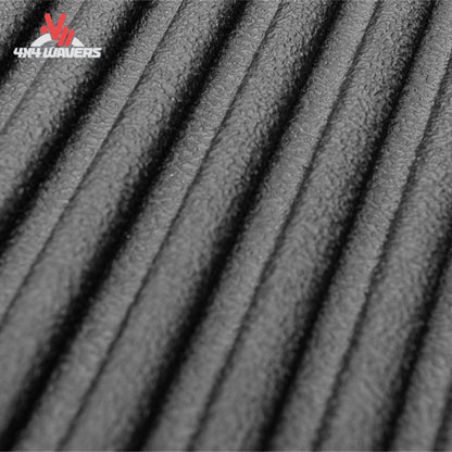 Rugged Liner Ford F-150 8' bedliner with textured surface and non-pooling floor ribs, designed for 2021-2026 Ford F-150 trucks.