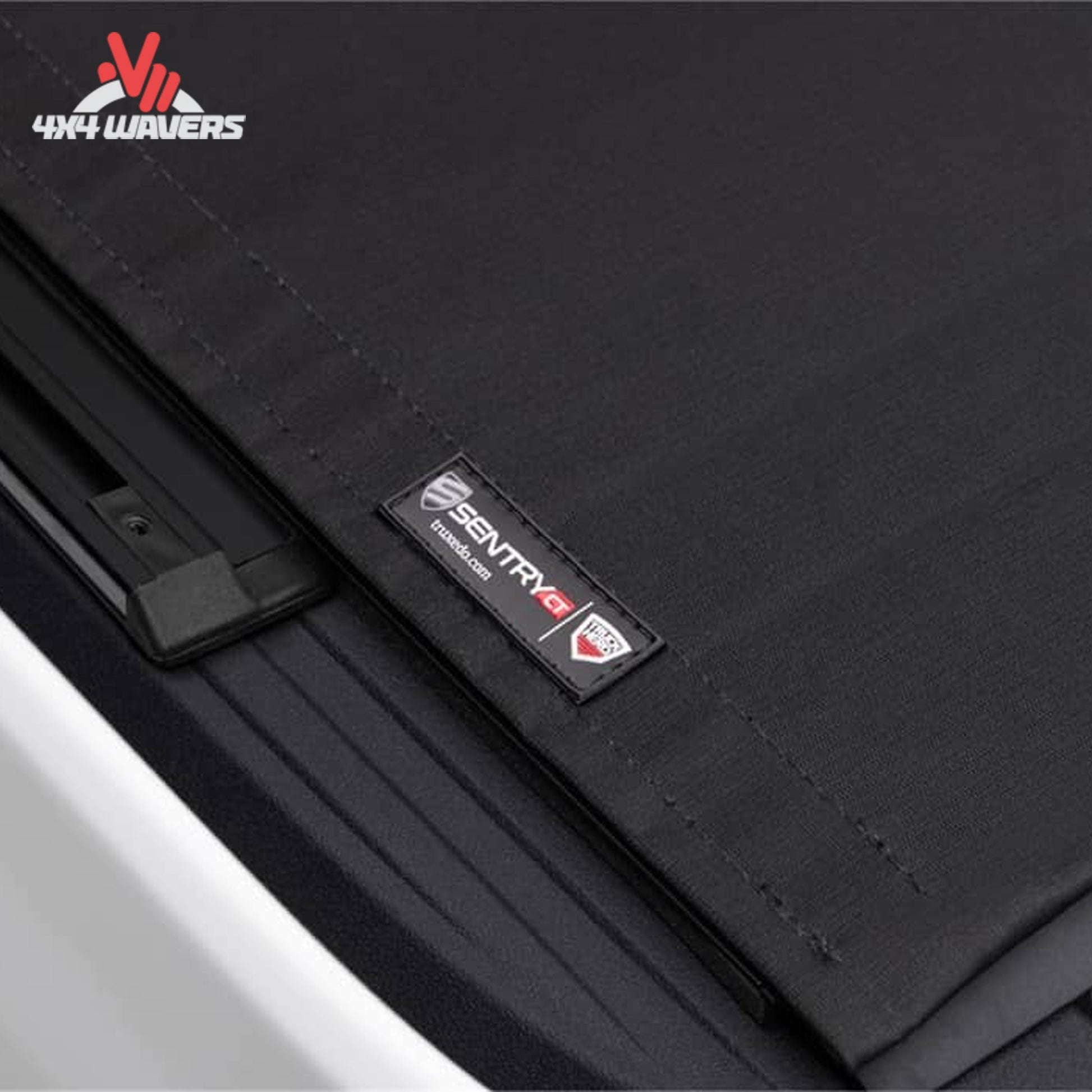 Close-up showing woven canvas bonded to interlocking aluminum slats for security and durability