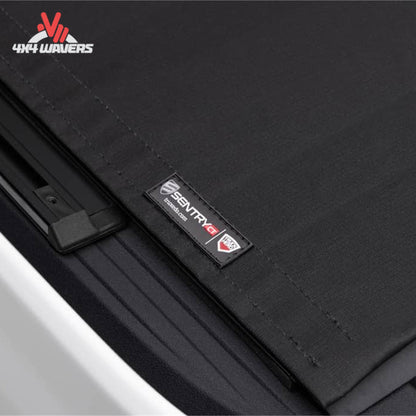 Close-up showing woven canvas bonded to interlocking aluminum slats for security and durability