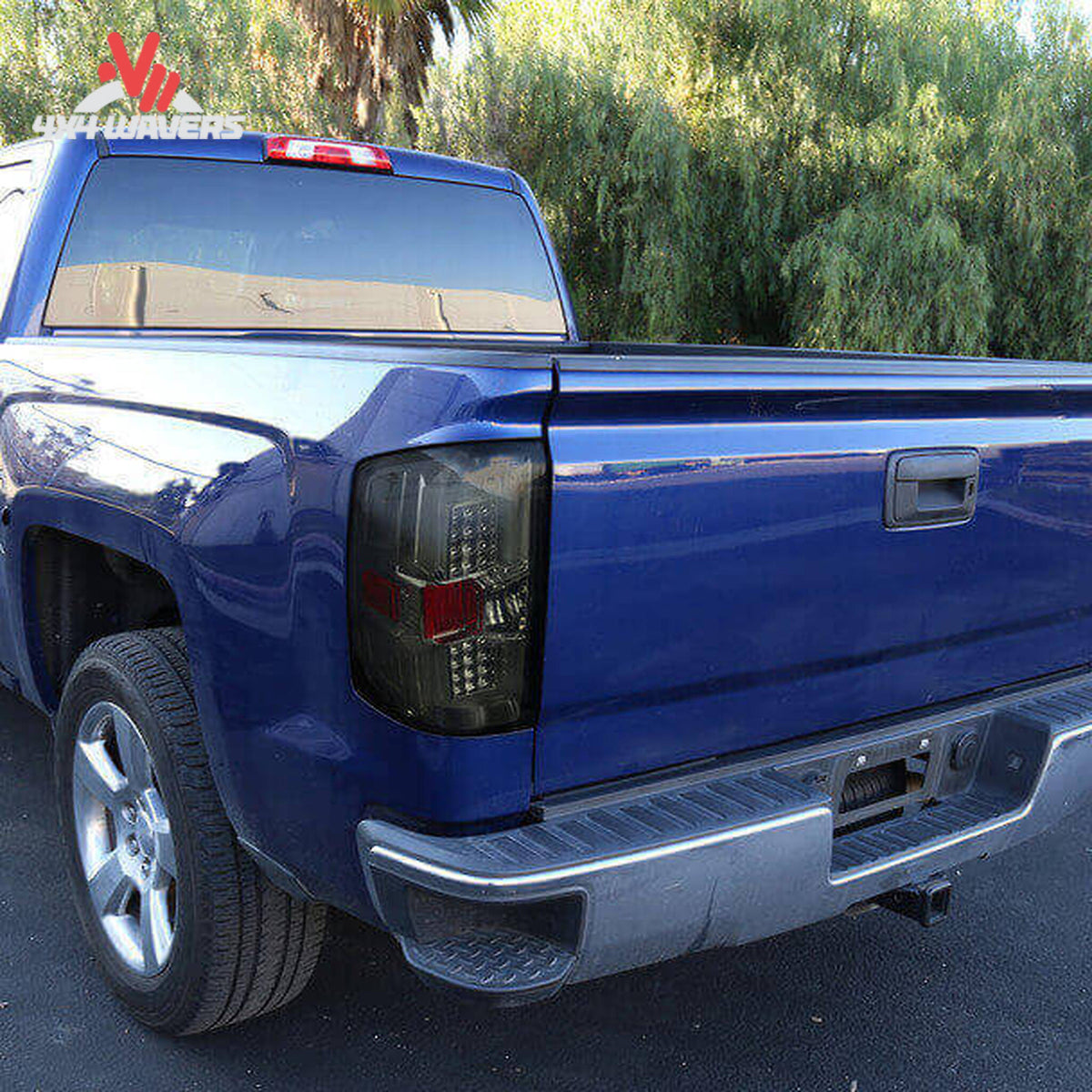 Spec-D Smoked LED tail lights installed on a 2014-2018 Silverado 2500HD, featuring sleek smoked lens design for enhanced style.
