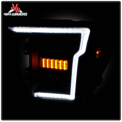 Spyder Auto black projector headlights for 2021-2023 Ford F-150 truck, featuring modern design and advanced lighting technology.