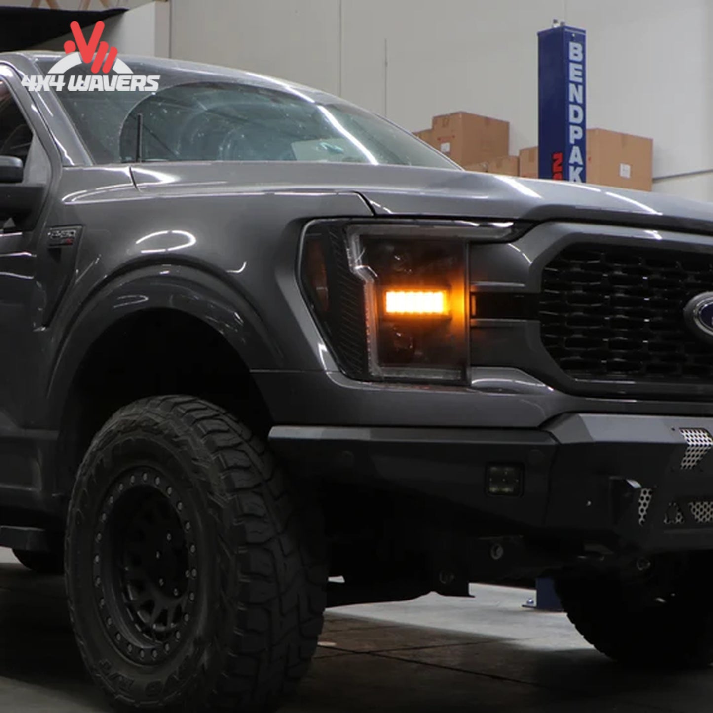 Spyder Auto projector headlights installed on a 2021-2023 Ford F-150 truck, showcasing modern LED design and clear lens.