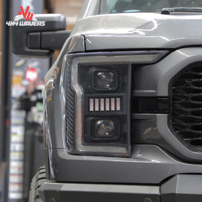 Spyder Auto projector headlights installed on a 2021-2023 Ford F-150 pickup truck, showcasing modern LED light design.