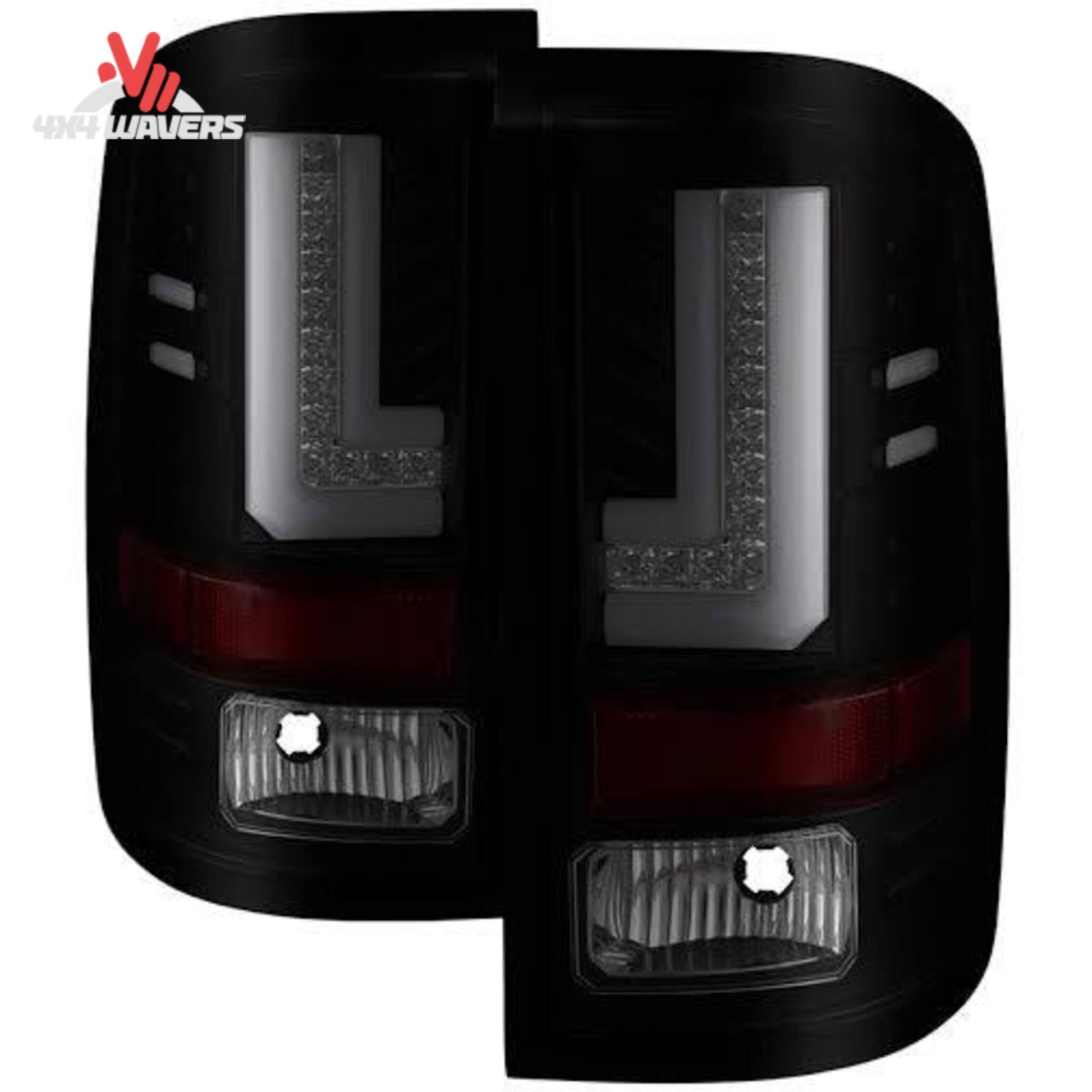 Spyder Auto smoked LED tail lights installed on a 2016-2019 GMC Sierra, showcasing sleek, smoked lens design for enhanced vehicle style.