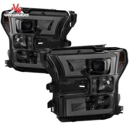 Spyder Auto smoked projector headlights for 2015-2017 Ford F-150 truck, featuring sleek design and advanced lighting technology.