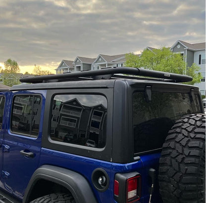 Go Rhino SRM500 65-inch flat platform roof rack installed on overland SUV for trucks and SUVs, durable outdoor vehicle accessory.