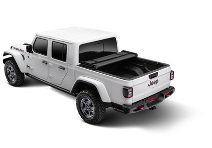 Extang Trifecta 2.0 soft folding tonneau cover open on a 2020-2026 Jeep Gladiator 5ft bed, showcasing easy foldability and durable fabric.