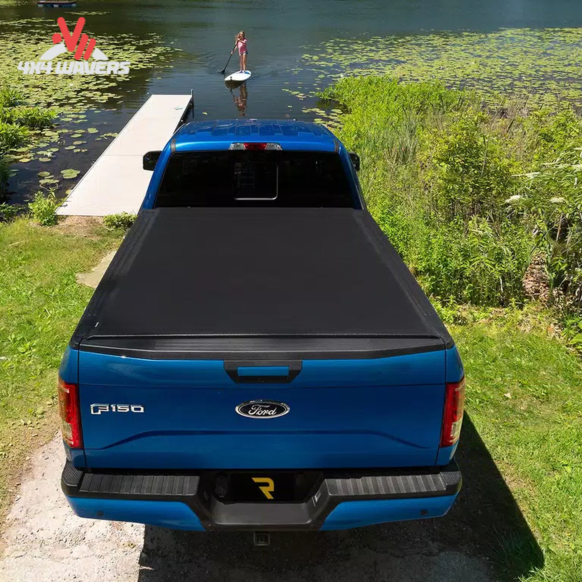 TruXedo Lo Pro soft roll-up tonneau cover installed on a 2009-2014 Ford F-150 with a 5.5-foot bed, showing the sleek cover on the truck bed